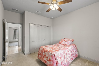Discover this beautifully maintained 3-bedroom, 2-bathroom home on The Grand Club Cypress Course in Florida - for sale on GolfHomes.com, golf home, golf lot