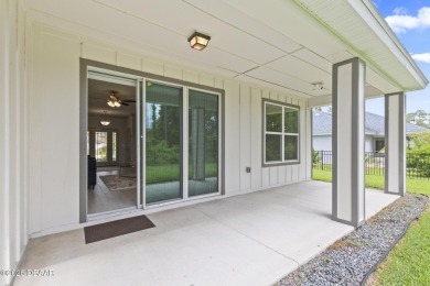 Discover this beautifully maintained 3-bedroom, 2-bathroom home on The Grand Club Cypress Course in Florida - for sale on GolfHomes.com, golf home, golf lot