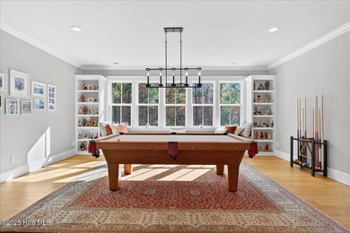 Situated within an exceptionally private cul-de-sac and embraced on Members Club At St. James Plantation in North Carolina - for sale on GolfHomes.com, golf home, golf lot