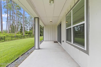 Discover this beautifully maintained 3-bedroom, 2-bathroom home on The Grand Club Cypress Course in Florida - for sale on GolfHomes.com, golf home, golf lot
