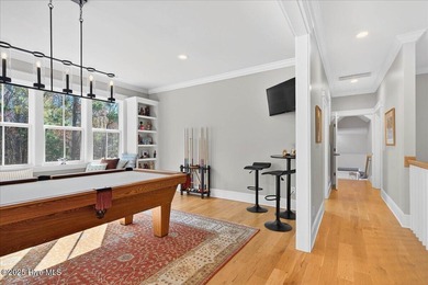 Situated within an exceptionally private cul-de-sac and embraced on Members Club At St. James Plantation in North Carolina - for sale on GolfHomes.com, golf home, golf lot