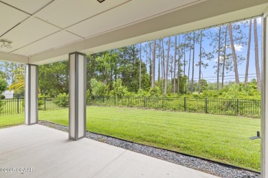 Discover this beautifully maintained 3-bedroom, 2-bathroom home on The Grand Club Cypress Course in Florida - for sale on GolfHomes.com, golf home, golf lot
