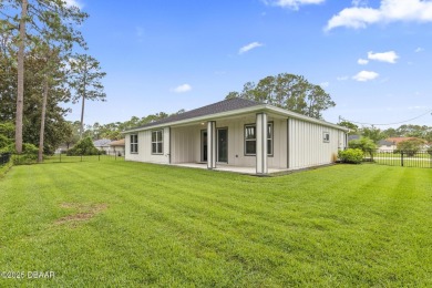 Discover this beautifully maintained 3-bedroom, 2-bathroom home on The Grand Club Cypress Course in Florida - for sale on GolfHomes.com, golf home, golf lot