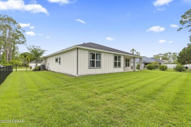 Discover this beautifully maintained 3-bedroom, 2-bathroom home on The Grand Club Cypress Course in Florida - for sale on GolfHomes.com, golf home, golf lot