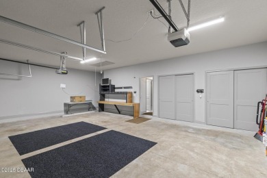 Discover this beautifully maintained 3-bedroom, 2-bathroom home on The Grand Club Cypress Course in Florida - for sale on GolfHomes.com, golf home, golf lot