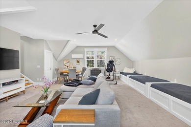 Situated within an exceptionally private cul-de-sac and embraced on Members Club At St. James Plantation in North Carolina - for sale on GolfHomes.com, golf home, golf lot