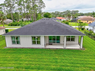 Discover this beautifully maintained 3-bedroom, 2-bathroom home on The Grand Club Cypress Course in Florida - for sale on GolfHomes.com, golf home, golf lot