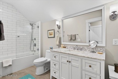 Situated within an exceptionally private cul-de-sac and embraced on Members Club At St. James Plantation in North Carolina - for sale on GolfHomes.com, golf home, golf lot