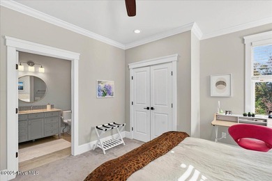 Situated within an exceptionally private cul-de-sac and embraced on Members Club At St. James Plantation in North Carolina - for sale on GolfHomes.com, golf home, golf lot