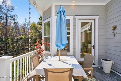 Situated within an exceptionally private cul-de-sac and embraced on Members Club At St. James Plantation in North Carolina - for sale on GolfHomes.com, golf home, golf lot