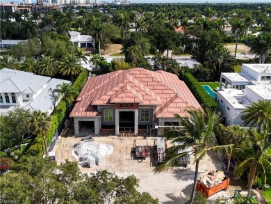 Luxurious 4 Bed/4.5 BA, 4,028 sqft home on a 100x160 lot awaits on The Moorings Country Club in Florida - for sale on GolfHomes.com, golf home, golf lot