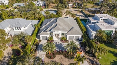 Luxurious 4 Bed/4.5 BA, 4,028 sqft home on a 100x160 lot awaits on The Moorings Country Club in Florida - for sale on GolfHomes.com, golf home, golf lot