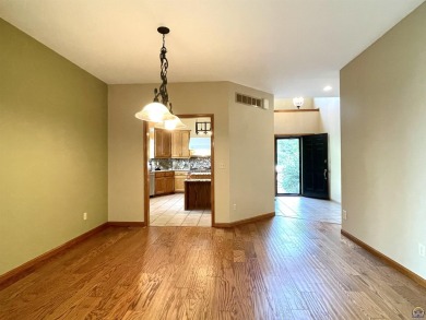 Meticulously maintained home with gorgeous lake views! Vinyl on Lake Perry Country Club in Kansas - for sale on GolfHomes.com, golf home, golf lot