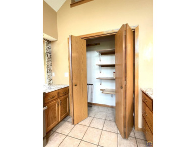 Meticulously maintained home with gorgeous lake views! Vinyl on Lake Perry Country Club in Kansas - for sale on GolfHomes.com, golf home, golf lot