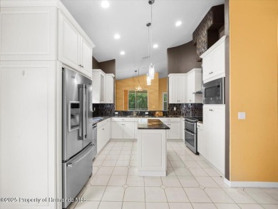Nicely updated 1996 Addison Castle Pines maintained home with 2 on Glen Lakes Country Club in Florida - for sale on GolfHomes.com, golf home, golf lot