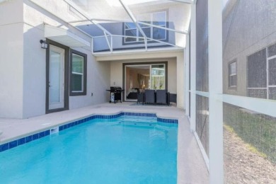 Step into luxury at this stunning 5-bedroom, 5-bath residence on National Golf Course in Florida - for sale on GolfHomes.com, golf home, golf lot