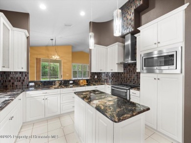 Nicely updated 1996 Addison Castle Pines maintained home with 2 on Glen Lakes Country Club in Florida - for sale on GolfHomes.com, golf home, golf lot