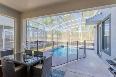 Step into luxury at this stunning 5-bedroom, 5-bath residence on National Golf Course in Florida - for sale on GolfHomes.com, golf home, golf lot