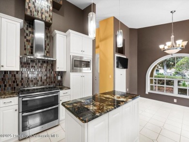 Nicely updated 1996 Addison Castle Pines maintained home with 2 on Glen Lakes Country Club in Florida - for sale on GolfHomes.com, golf home, golf lot