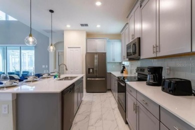 Step into luxury at this stunning 5-bedroom, 5-bath residence on National Golf Course in Florida - for sale on GolfHomes.com, golf home, golf lot