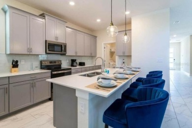 Step into luxury at this stunning 5-bedroom, 5-bath residence on National Golf Course in Florida - for sale on GolfHomes.com, golf home, golf lot