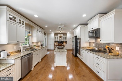 BASK IN A CONTENTED COUNTRY CLUB LIFESTYLE!  BAY HILLS GOLF on Bay Hills Golf Club in Maryland - for sale on GolfHomes.com, golf home, golf lot