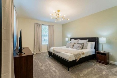 Step into luxury at this stunning 5-bedroom, 5-bath residence on National Golf Course in Florida - for sale on GolfHomes.com, golf home, golf lot