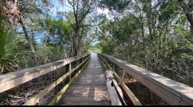 Your Own Sunshine Awaits In This Intracoastal Frontage Coastal on Ocean Palm Golf Course in Florida - for sale on GolfHomes.com, golf home, golf lot
