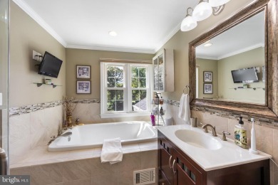 BASK IN A CONTENTED COUNTRY CLUB LIFESTYLE!  BAY HILLS GOLF on Bay Hills Golf Club in Maryland - for sale on GolfHomes.com, golf home, golf lot
