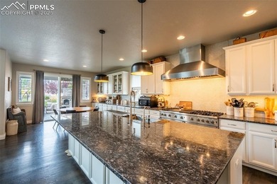 Stunning 7-bedroom, 5.5-bath home in the coveted Flying Horse on The Club At Flying Horse in Colorado - for sale on GolfHomes.com, golf home, golf lot