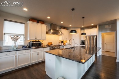 Stunning 7-bedroom, 5.5-bath home in the coveted Flying Horse on The Club At Flying Horse in Colorado - for sale on GolfHomes.com, golf home, golf lot