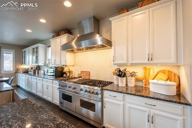 Stunning 7-bedroom, 5.5-bath home in the coveted Flying Horse on The Club At Flying Horse in Colorado - for sale on GolfHomes.com, golf home, golf lot