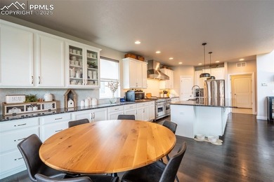 Stunning 7-bedroom, 5.5-bath home in the coveted Flying Horse on The Club At Flying Horse in Colorado - for sale on GolfHomes.com, golf home, golf lot