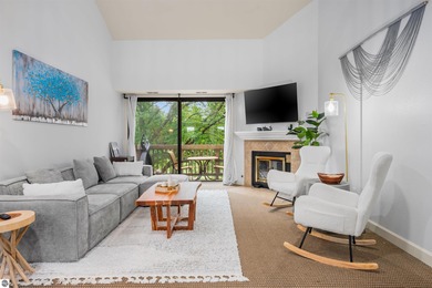 Perched above the third tee of Spruce Run Golf Course, this on Grand Traverse Resort and Spa in Michigan - for sale on GolfHomes.com, golf home, golf lot