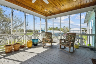 Welcome to your ideal coastal getaway nestled in the heart of on Pass Christian Isles Golf Club in Mississippi - for sale on GolfHomes.com, golf home, golf lot