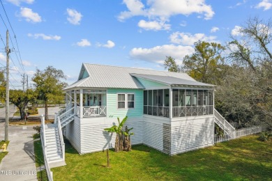 Welcome to your ideal coastal getaway nestled in the heart of on Pass Christian Isles Golf Club in Mississippi - for sale on GolfHomes.com, golf home, golf lot