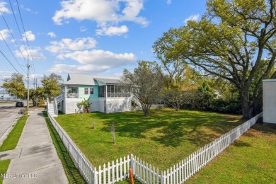 Welcome to your ideal coastal getaway nestled in the heart of on Pass Christian Isles Golf Club in Mississippi - for sale on GolfHomes.com, golf home, golf lot