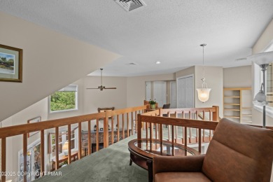 Views are just one feature that make this golf course home on Buck Hill Golf Club  in Pennsylvania - for sale on GolfHomes.com, golf home, golf lot