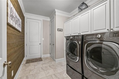 Located in The Georgian, this peaceful, family-oriented on The Frog Golf Club in Georgia - for sale on GolfHomes.com, golf home, golf lot