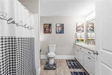 Located in The Georgian, this peaceful, family-oriented on The Frog Golf Club in Georgia - for sale on GolfHomes.com, golf home, golf lot