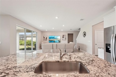 Stunning 4-Bedroom Pond View Home in Gated Star Farms at on Esplanade Golf and Country at Lakewood Ranch in Florida - for sale on GolfHomes.com, golf home, golf lot