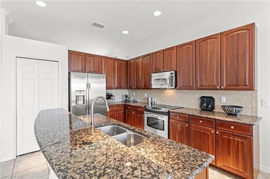 Discover this exceptional Marbella residence in the highly on Spanish Wells Golf and Country Club in Florida - for sale on GolfHomes.com, golf home, golf lot