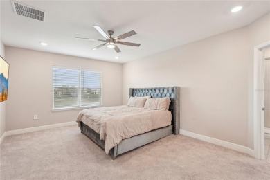 Stunning 4-Bedroom Pond View Home in Gated Star Farms at on Esplanade Golf and Country at Lakewood Ranch in Florida - for sale on GolfHomes.com, golf home, golf lot