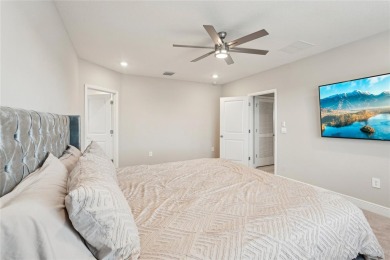 Stunning 4-Bedroom Pond View Home in Gated Star Farms at on Esplanade Golf and Country at Lakewood Ranch in Florida - for sale on GolfHomes.com, golf home, golf lot