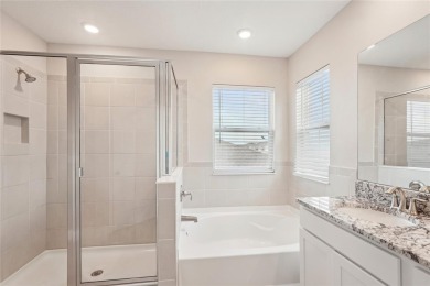Stunning 4-Bedroom Pond View Home in Gated Star Farms at on Esplanade Golf and Country at Lakewood Ranch in Florida - for sale on GolfHomes.com, golf home, golf lot