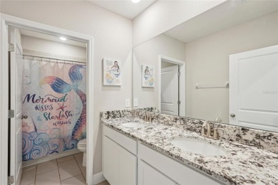 Stunning 4-Bedroom Pond View Home in Gated Star Farms at on Esplanade Golf and Country at Lakewood Ranch in Florida - for sale on GolfHomes.com, golf home, golf lot