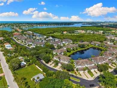 Inviting coach home featuring an open, spacious floor plan with on Windstar on Naples Bay in Florida - for sale on GolfHomes.com, golf home, golf lot