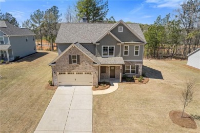 Live the Resort Lifestyle in the Stunning Southport Model by on Traditions of Braselton Golf Club in Georgia - for sale on GolfHomes.com, golf home, golf lot