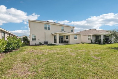 Stunning 4-Bedroom Pond View Home in Gated Star Farms at on Esplanade Golf and Country at Lakewood Ranch in Florida - for sale on GolfHomes.com, golf home, golf lot
