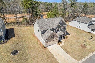 Live the Resort Lifestyle in the Stunning Southport Model by on Traditions of Braselton Golf Club in Georgia - for sale on GolfHomes.com, golf home, golf lot